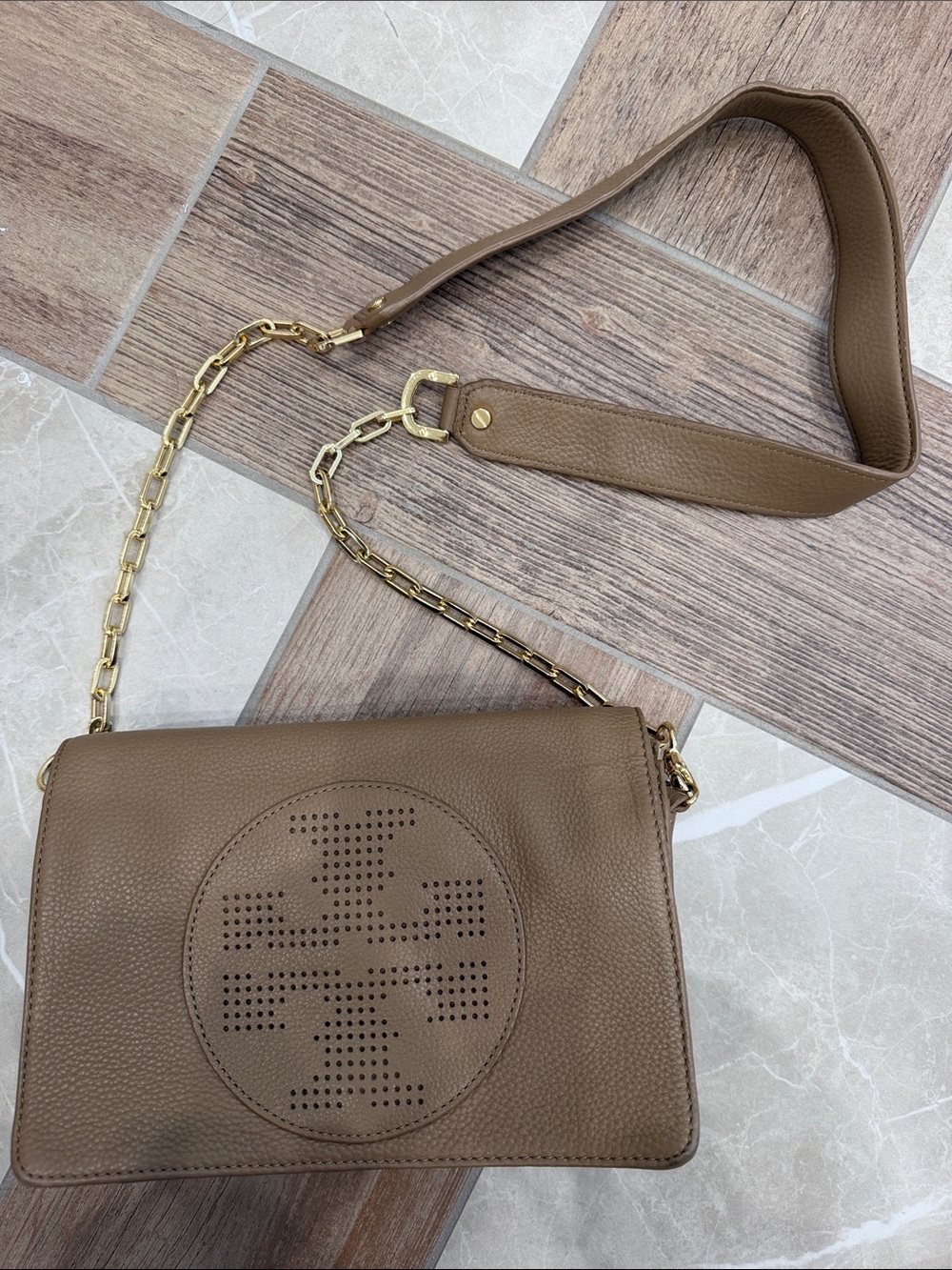 Tory Burch Pebbled Leather
Perforated Logo Crossbody